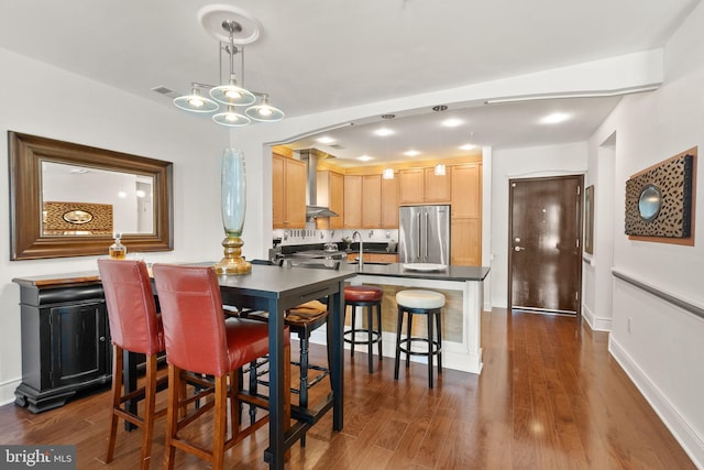 1418 N Rhodes St Unit B105, Arlington, VA 22209 - dining area with dark wood-style flooring and baseboards
