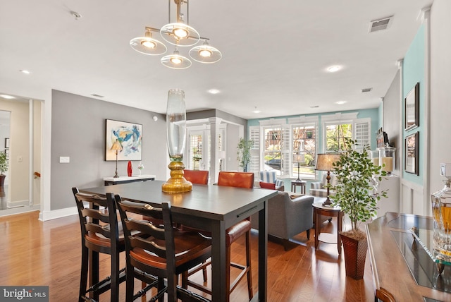 1418 N Rhodes St Unit B105, Arlington, VA 22209 - dining area featuring light wood-style floors, recessed lighting, and baseboards