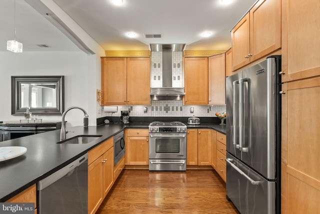 1418 N Rhodes St Unit B105, Arlington, VA 22209 - kitchen with stainless steel appliances, wall chimney exhaust hood, a sink, dark countertops, and decorative backsplash