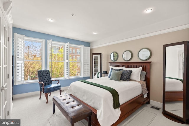 1418 N Rhodes St Unit B105, Arlington, VA 22209 - bedroom with baseboards, light carpet, multiple windows, french doors, and recessed lighting