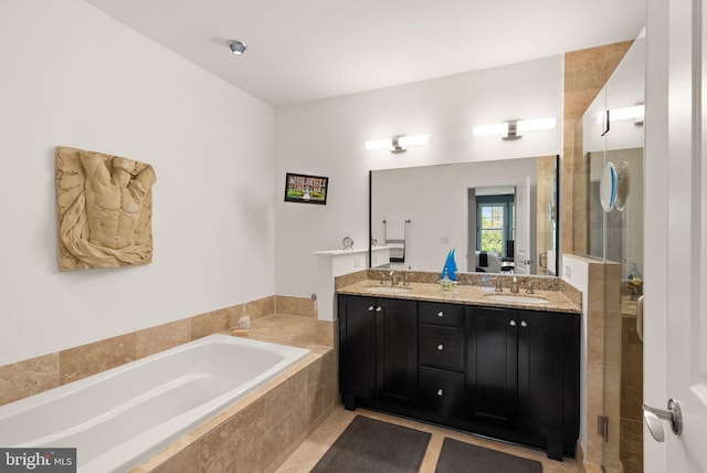 1418 N Rhodes St Unit B105, Arlington, VA 22209 - bathroom featuring a garden tub, double vanity, and a stall shower