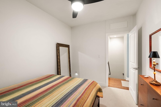 1418 N Rhodes St Unit B105, Arlington, VA 22209 - bedroom featuring a ceiling fan, light colored carpet, and baseboards