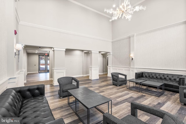 1418 N Rhodes St Unit B105, Arlington, VA 22209 - common area featuring a high ceiling, a decorative wall, crown molding, and wainscoting