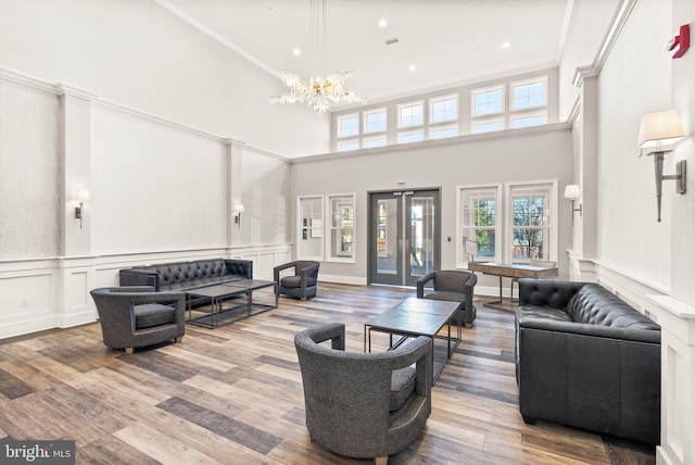 1418 N Rhodes St Unit B105, Arlington, VA 22209 - building lobby featuring a decorative wall, a towering ceiling, ornamental molding, and wainscoting