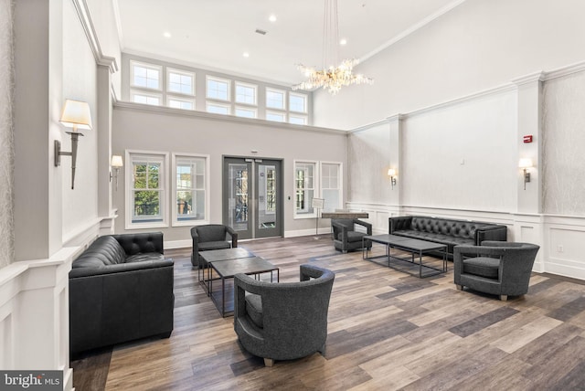 1418 N Rhodes St Unit B105, Arlington, VA 22209 - building lobby with a high ceiling, ornamental molding, a decorative wall, and wainscoting