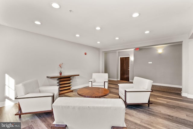 1418 N Rhodes St Unit B105, Arlington, VA 22209 - living room featuring recessed lighting, baseboards, and wood finished floors
