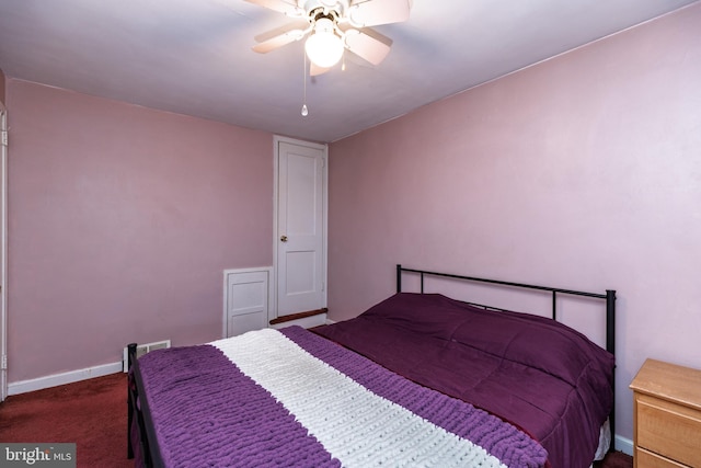 bedroom with carpet, a ceiling fan, and baseboards