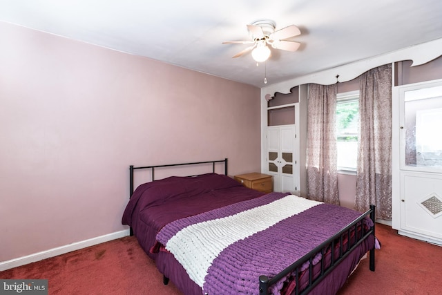 bedroom with carpet flooring and a ceiling fan