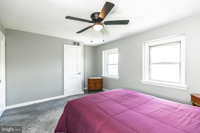 bedroom featuring carpet floors, baseboards, and ceiling fan