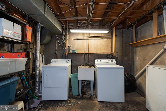 laundry room with separate washer and dryer