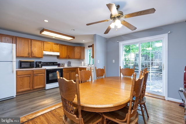 dining area with wood finished floors, recessed lighting, and ceiling fan