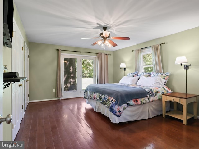 bedroom with hardwood / wood-style floors, baseboards, a ceiling fan, and access to exterior