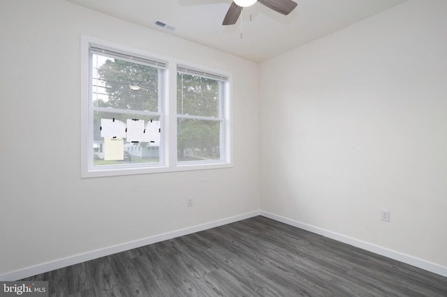 1207 Race St, Cambridge, MD 21613 - unfurnished room with dark wood finished floors, a ceiling fan, and baseboards