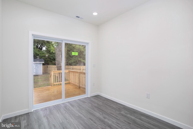 1207 Race St, Cambridge, MD 21613 - empty room with wood finished floors, baseboards, and recessed lighting