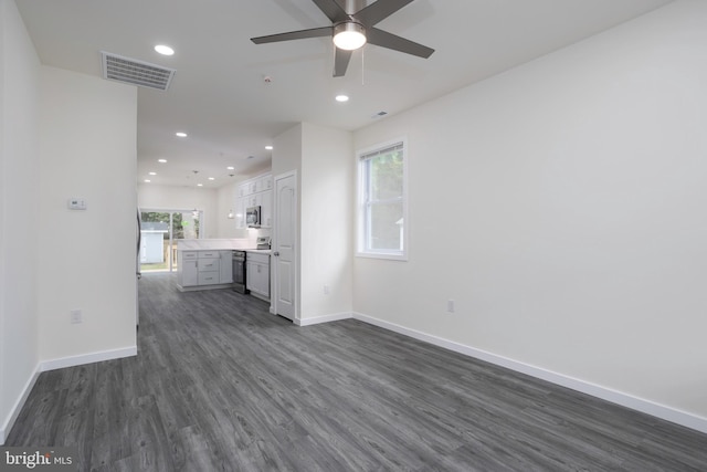 1207 Race St, Cambridge, MD 21613 - unfurnished living room featuring dark wood-type flooring, baseboards, recessed lighting, and ceiling fan