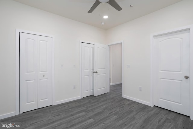 1207 Race St, Cambridge, MD 21613 - unfurnished bedroom with dark wood finished floors, two closets, baseboards, ceiling fan, and recessed lighting