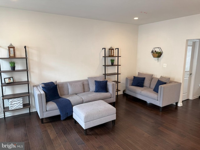living room featuring recessed lighting, wood finished floors, and baseboards