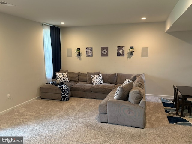 living room featuring carpet, recessed lighting, and baseboards