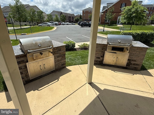 43222 Thoroughfare Gap Ter, Ashburn, VA 20148 - view of patio featuring a residential view
