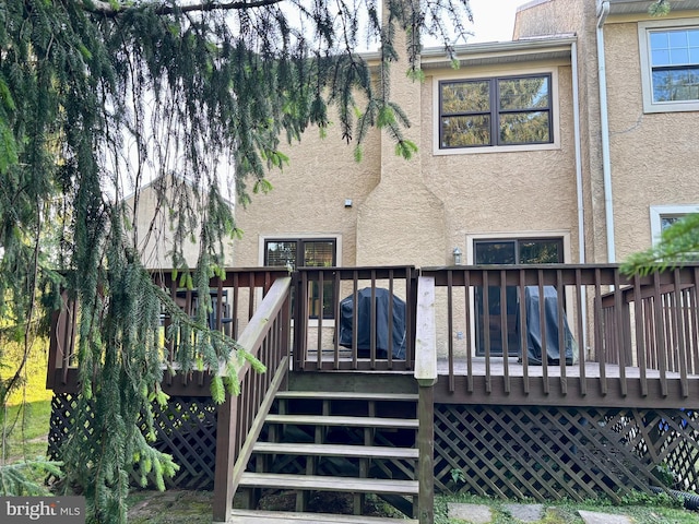 226 Smallwood Ct, West Chester, PA 19380 - back of property featuring stucco siding, stairs, and a deck