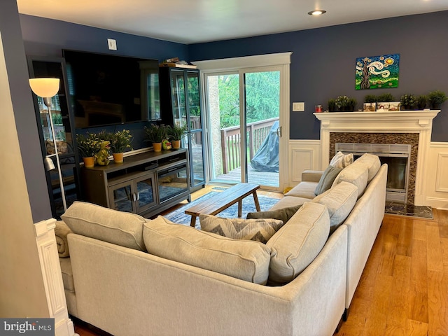 226 Smallwood Ct, West Chester, PA 19380 - living area with wood finished floors, a fireplace, wainscoting, and recessed lighting