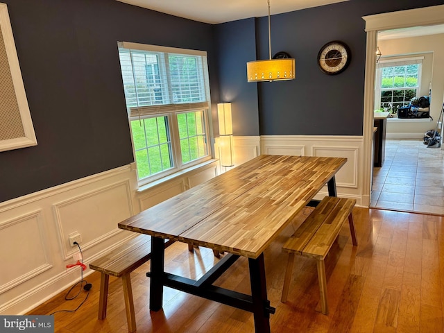 226 Smallwood Ct, West Chester, PA 19380 - dining room with a decorative wall, wood-type flooring, and wainscoting