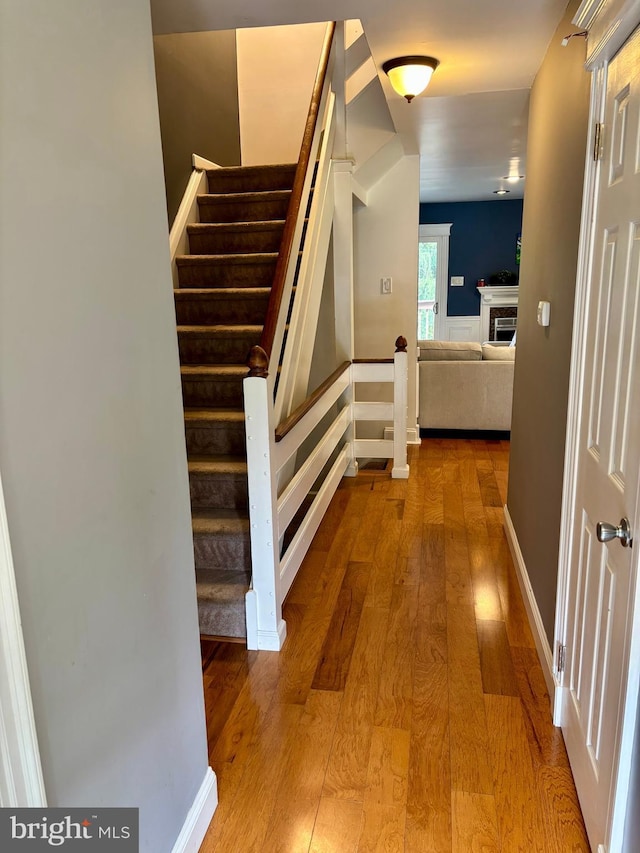226 Smallwood Ct, West Chester, PA 19380 - corridor with wood-type flooring and stairs
