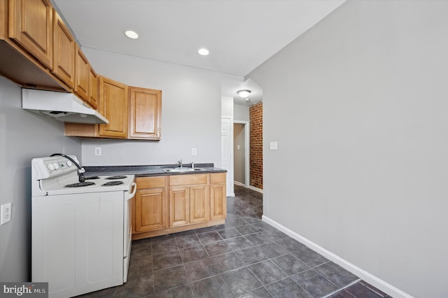 3238 Jasper St, Philadelphia, PA 19134 - kitchen with white electric stove, dark countertops, a sink, under cabinet range hood, and dark tile patterned flooring