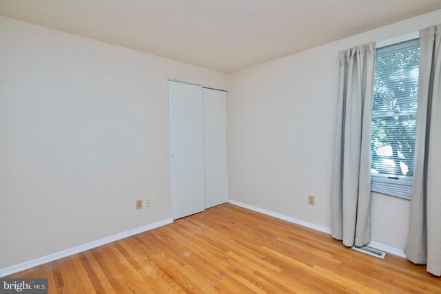 9520 Perry Brook Ct, Nottingham, MD 21236 - unfurnished room with light wood finished floors and baseboards