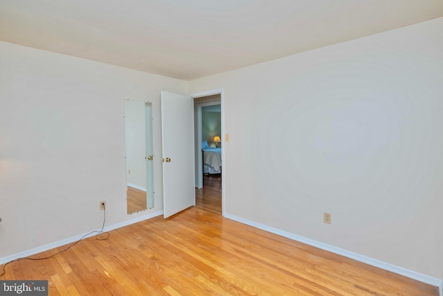 9520 Perry Brook Ct, Nottingham, MD 21236 - spare room featuring light wood-style flooring and baseboards