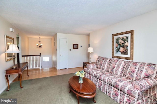 9520 Perry Brook Ct, Nottingham, MD 21236 - carpeted living area with a chandelier and a textured ceiling