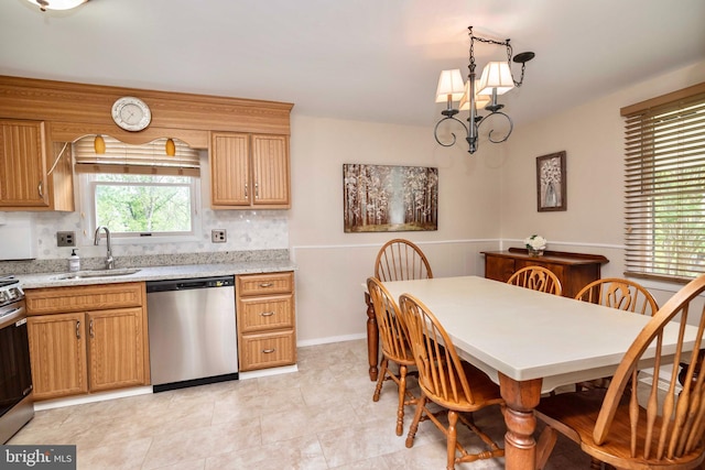 9520 Perry Brook Ct, Nottingham, MD 21236 - kitchen with appliances with stainless steel finishes, a sink, a chandelier, tasteful backsplash, and baseboards