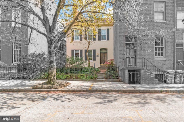 view of front of property with brick siding