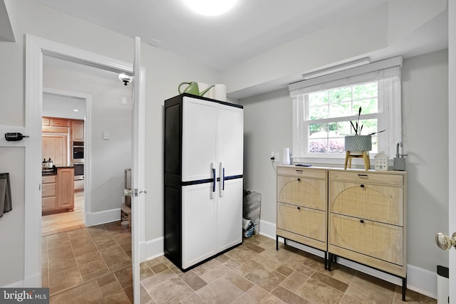 interior space with baseboards