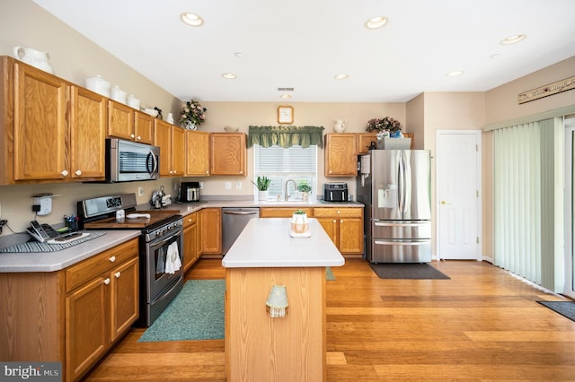 24 Smithfield Way, Fredericksburg, VA 22406 - kitchen with stainless steel appliances, light wood-style floors, light countertops, and recessed lighting