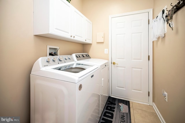 24 Smithfield Way, Fredericksburg, VA 22406 - laundry room featuring washer and dryer, cabinet space, and light tile patterned flooring