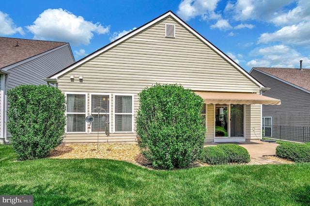 24 Smithfield Way, Fredericksburg, VA 22406 - back of property with a yard and a patio area