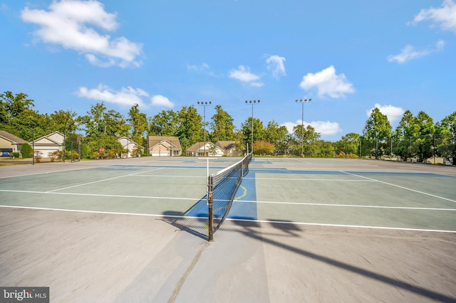 24 Smithfield Way, Fredericksburg, VA 22406 - view of tennis court with community basketball court and view of scattered trees