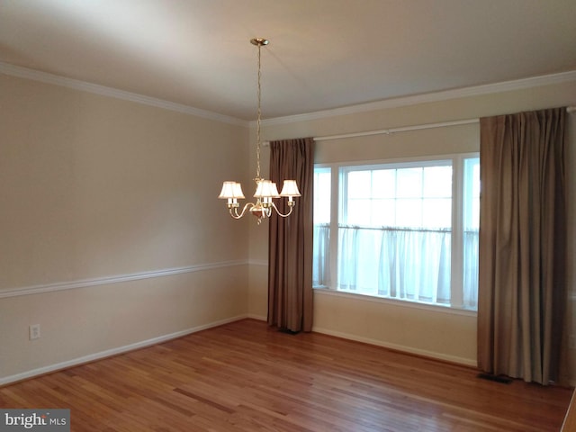 1372 Summerswood Dr, Saint Thomas, PA 17252 - unfurnished room with a chandelier, wood finished floors, baseboards, and ornamental molding