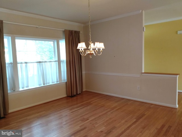 1372 Summerswood Dr, Saint Thomas, PA 17252 - spare room with ornamental molding, wood finished floors, baseboards, and a chandelier
