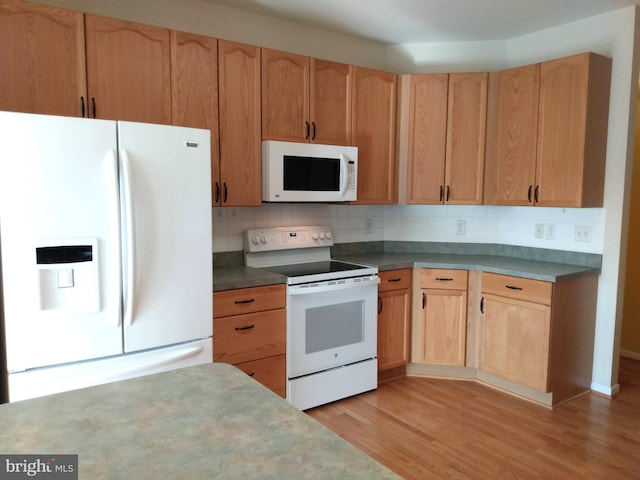 1372 Summerswood Dr, Saint Thomas, PA 17252 - kitchen with white appliances, light wood finished floors, decorative backsplash, and light brown cabinetry