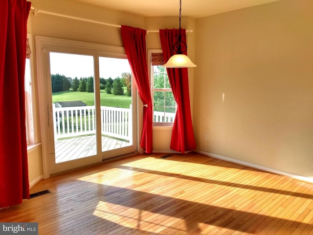 1372 Summerswood Dr, Saint Thomas, PA 17252 - unfurnished dining area featuring hardwood / wood-style floors and baseboards