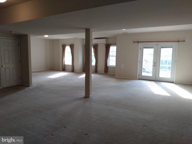 1372 Summerswood Dr, Saint Thomas, PA 17252 - basement featuring a wall mounted air conditioner, light colored carpet, and baseboards