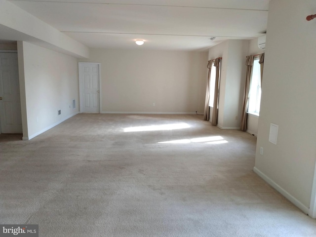 1372 Summerswood Dr, Saint Thomas, PA 17252 - empty room featuring light colored carpet, a wall mounted air conditioner, and baseboards