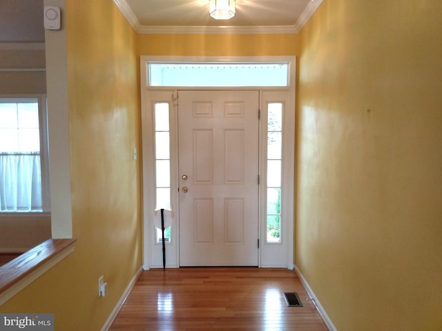 1372 Summerswood Dr, Saint Thomas, PA 17252 - foyer with crown molding, baseboards, and wood finished floors