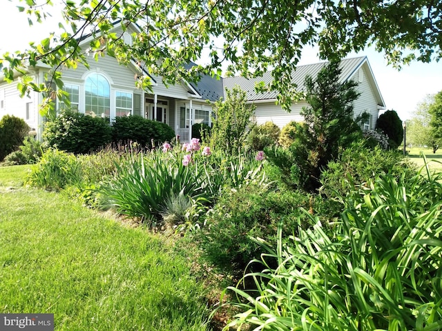 1372 Summerswood Dr, Saint Thomas, PA 17252 - view of front of home featuring metal roof, a front yard, and a standing seam roof
