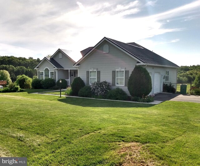 1372 Summerswood Dr, Saint Thomas, PA 17252 - ranch-style home with a front lawn, driveway, an attached garage, and metal roof