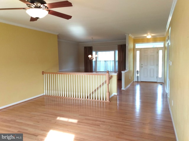1372 Summerswood Dr, Saint Thomas, PA 17252 - entryway featuring crown molding, wood finished floors, baseboards, a ceiling fan, and a chandelier