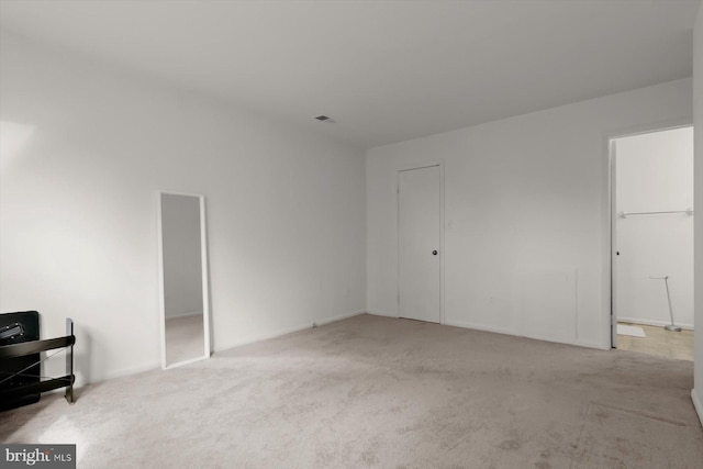 unfurnished bedroom with carpet floors