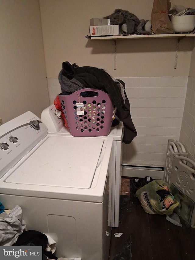 washroom with washing machine and dryer